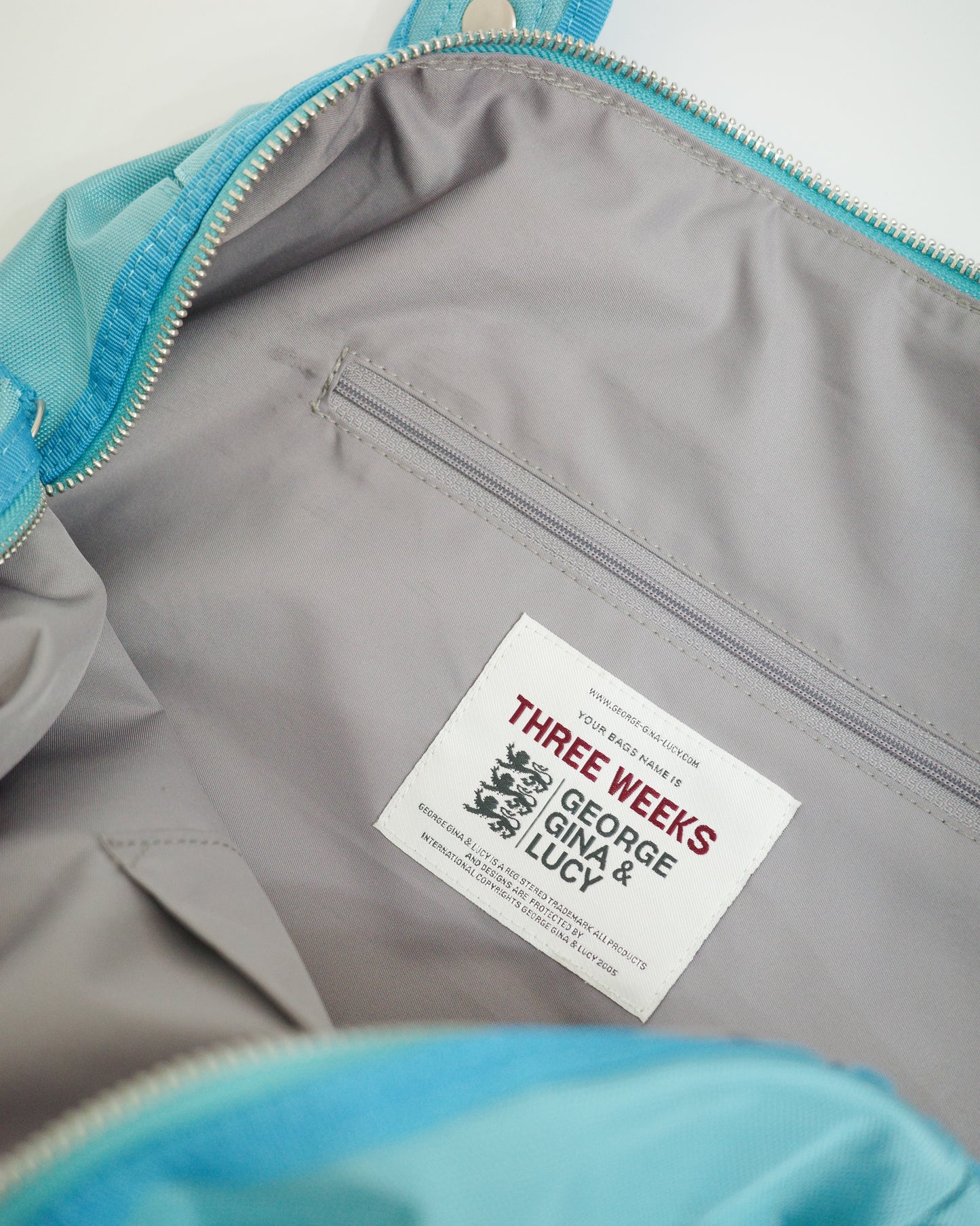 George Gina & Lucy "Three Weeks" Teal Bag